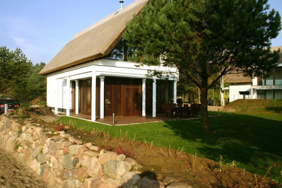 Reetgedecktes Ferienhaus mit Sonnenterrasse